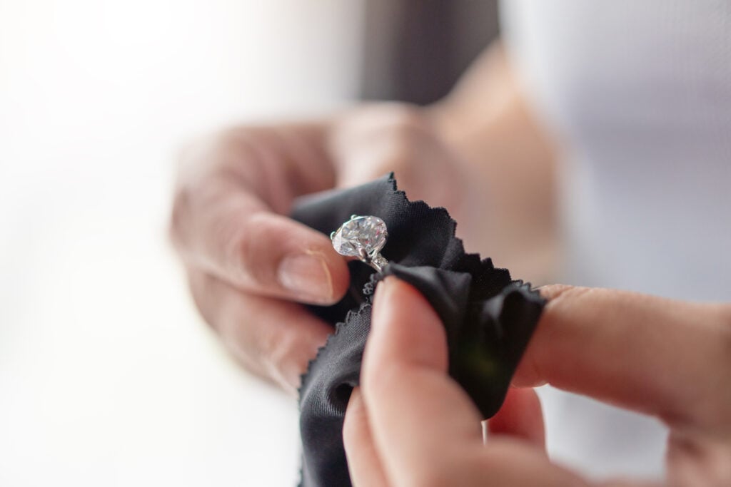 A jeweller examining a ring.