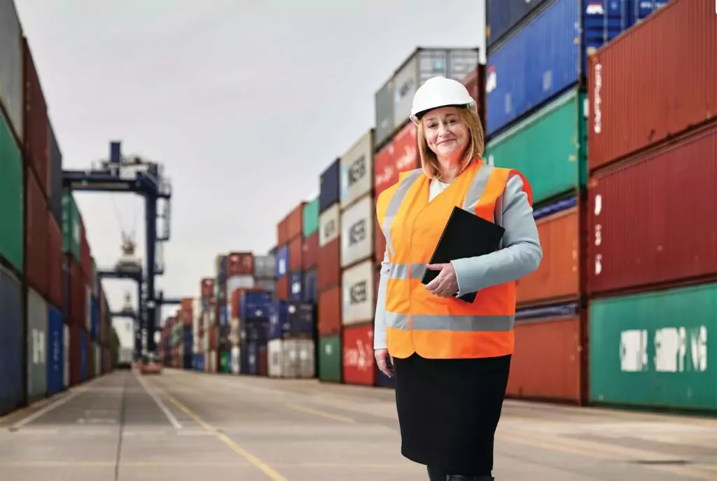 Export Finance Manager in hi-vis at a container port