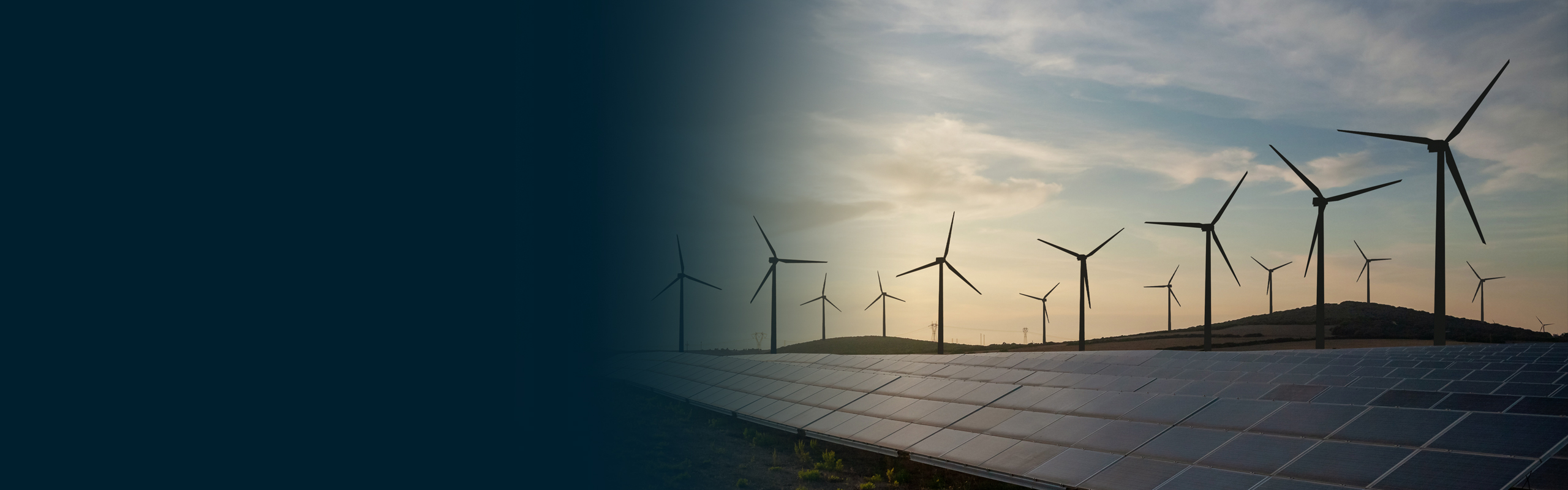 wind farm and solar panels in landscape