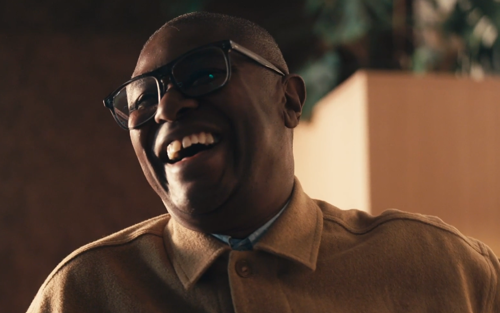 A man laughing.