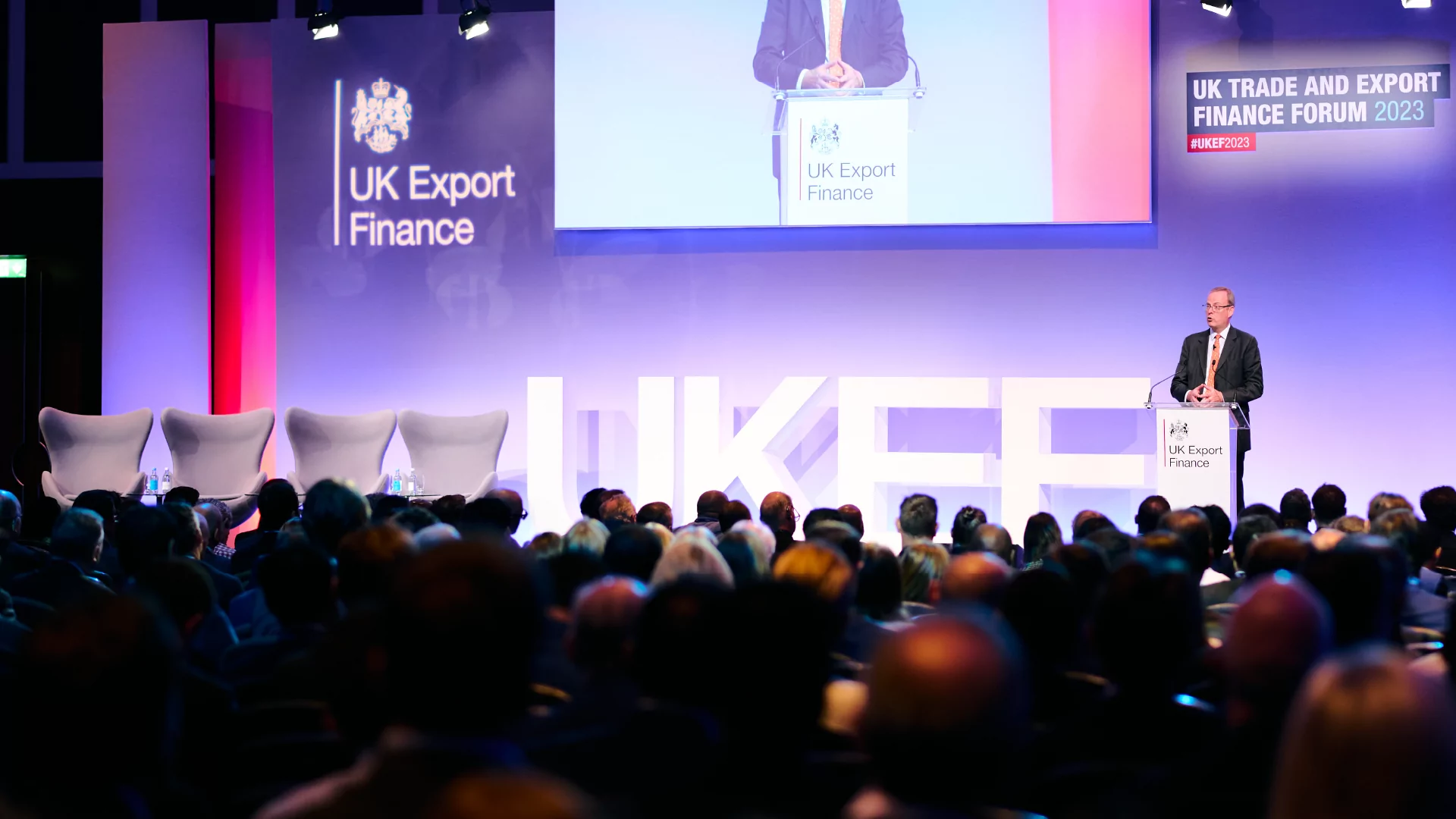 UK Export Finance Chief Executive Tim Reid speaking on stage at the UK Trade and Export Finance Forum.